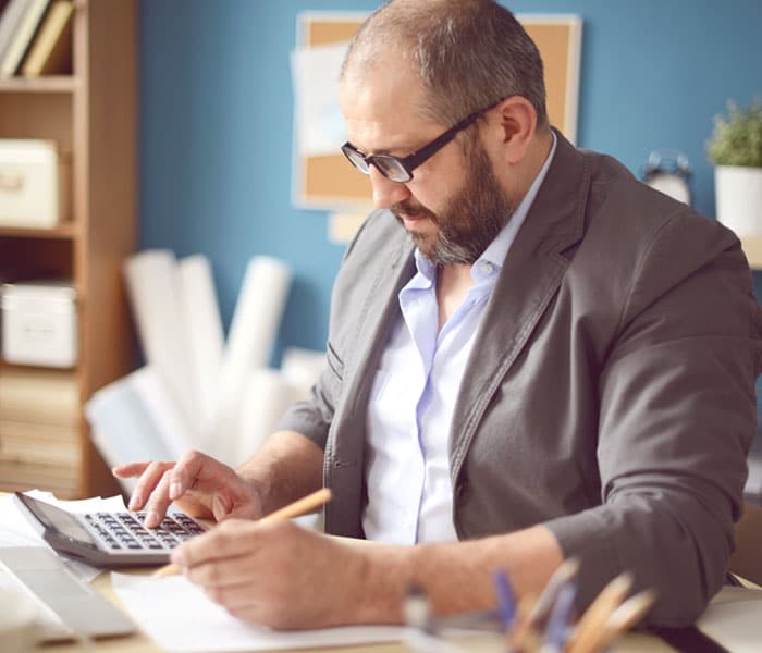 pnb-business-bank Man going over business finances