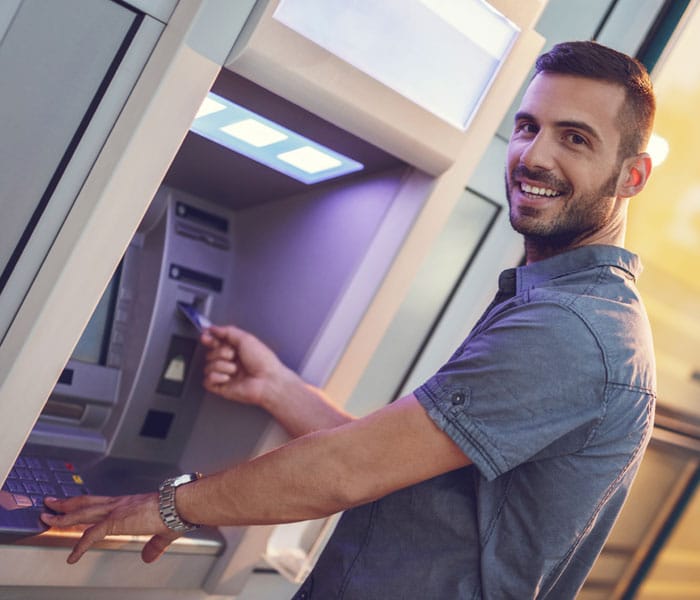 pnb-personal-banking Man at ATM