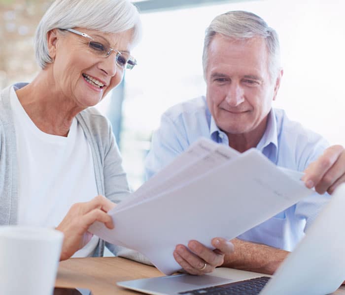 pnb-personal-plan Older couple looking over paperwork