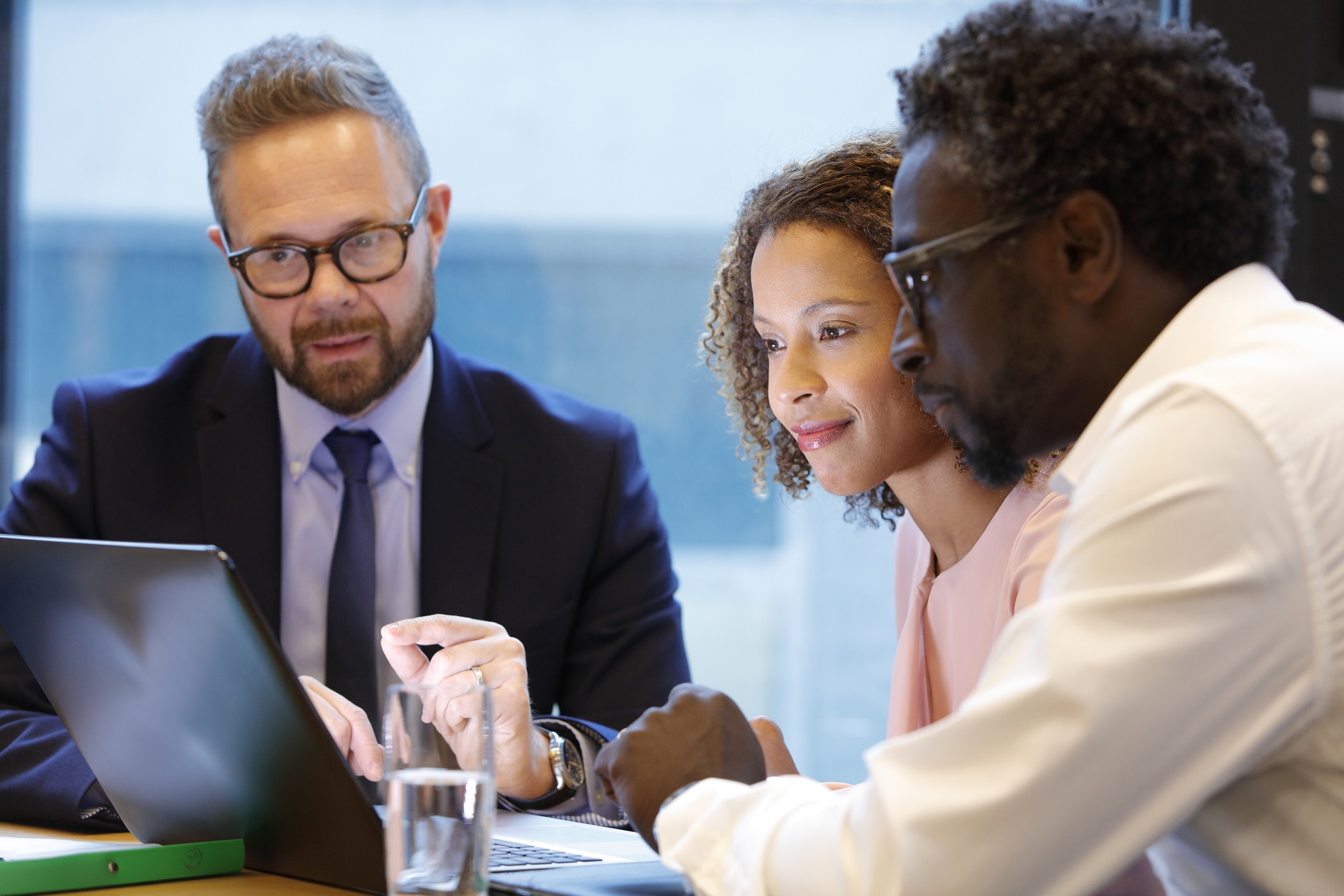 Couple with advisor at computer